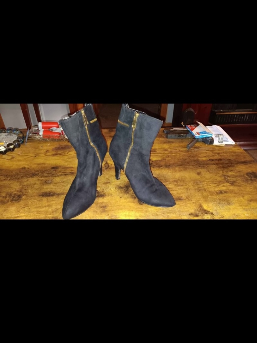 Pointed-Toe Black Suede Ankle Booties with Gold Zipper Detail